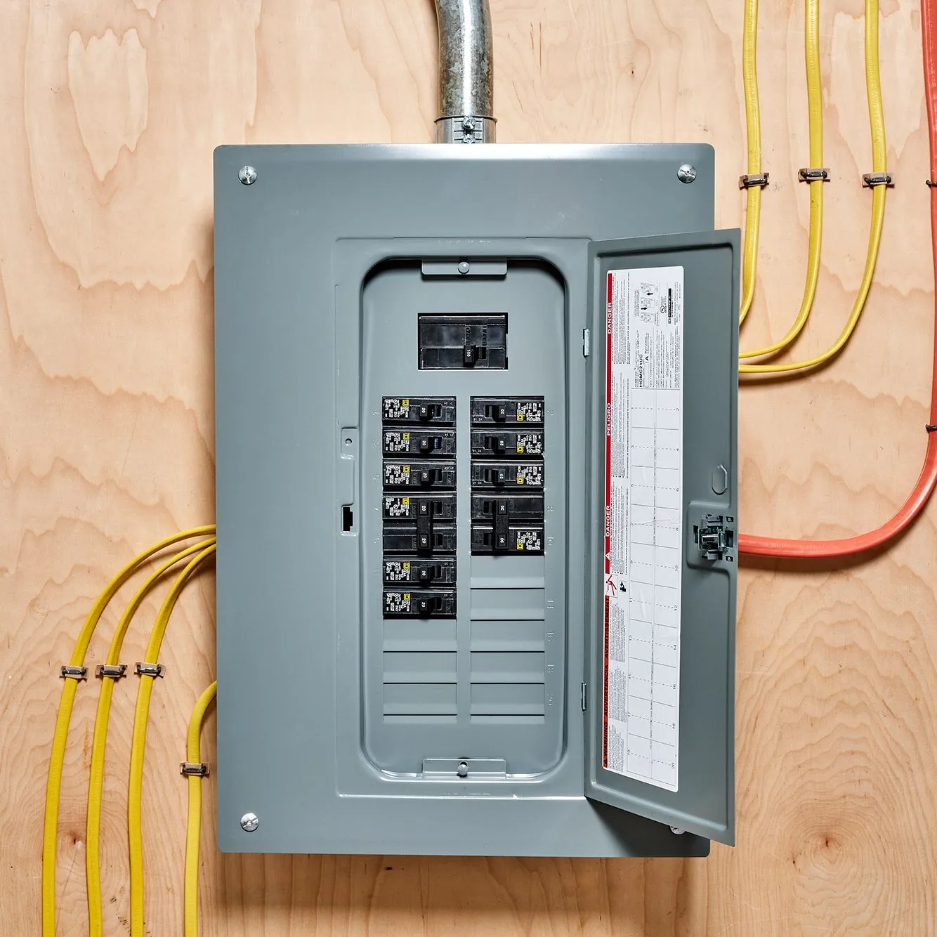 An electrical panel with multiple wires attached to it